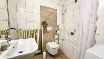Hair dryer, towels, soap, toilet paper