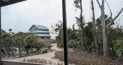 Your private beach retreat awaits! Heated pool, free ferry & parking!