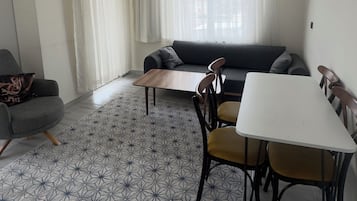 Family Twin Room, Balcony, City View | Living area