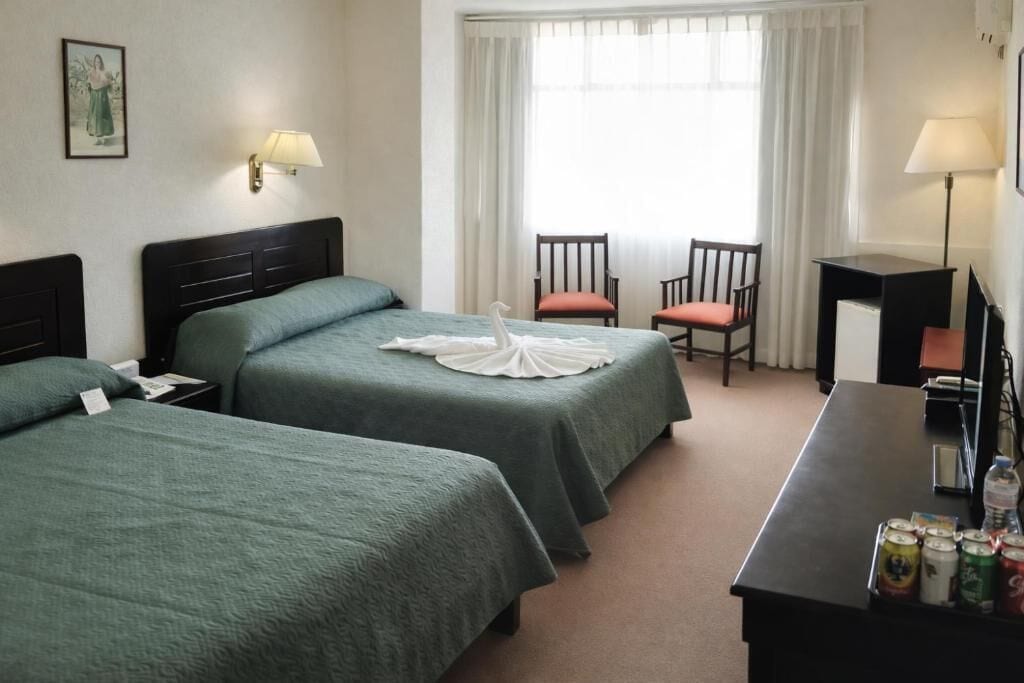 Quarto quádruplo standard, vista para a cidade