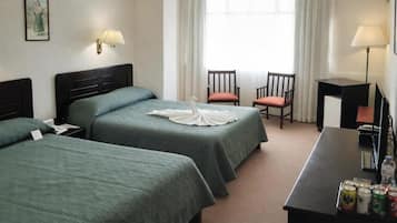 Quarto quádruplo standard, vista para a cidade