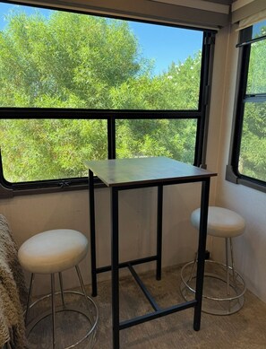 Dining - Luxuray 1-bedroom 1.5 bathroom RV - 2 miles from festival grounds (Thermal)