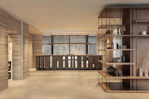 A modern interior with a wooden reception desk, a glass partition, and a shelving unit with decorative items. - Sugata Hotel Osaka Shinsaibashi, Series By Marriott (Osaka)