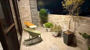 Comfort Quadruple Room, City View | Terrace/patio