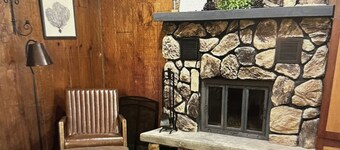 Cozy chalet located in Ski Brule Village features 4 bedrooms and 2 living areas.