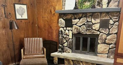 Cozy chalet located in Ski Brule Village features 4 bedrooms and 2 living areas.
