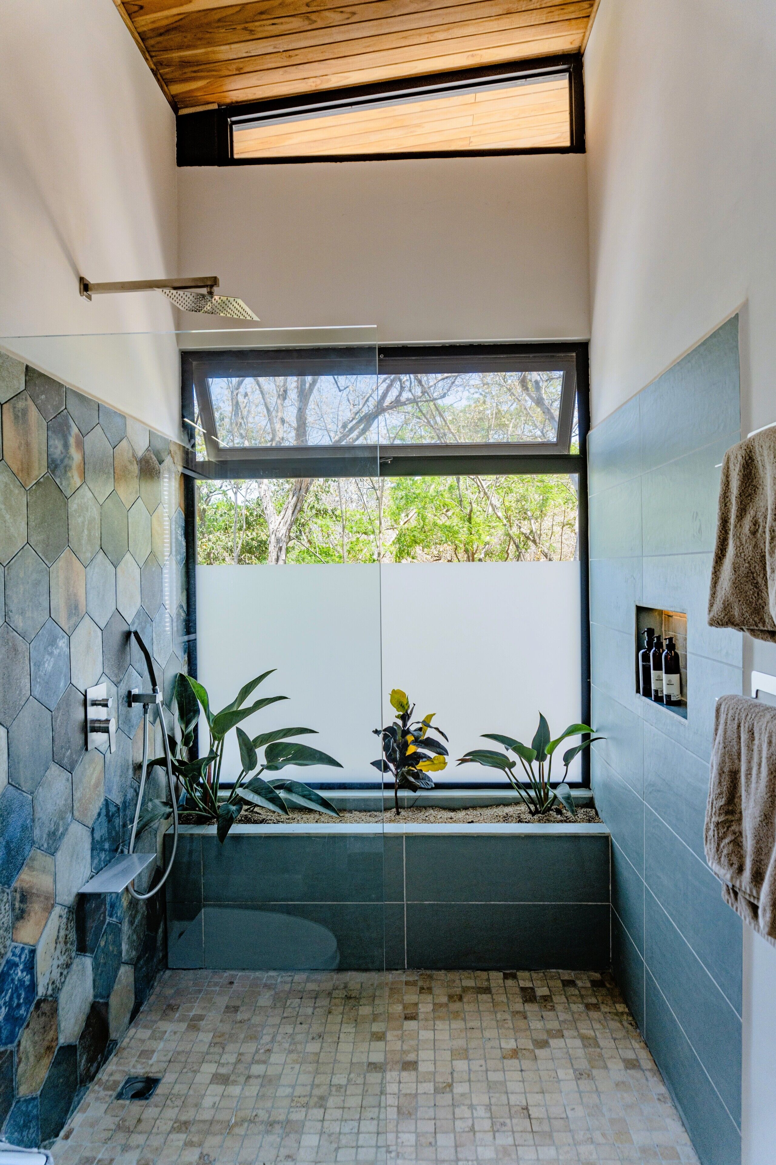 Shower, eco-friendly toiletries, hair dryer, towels