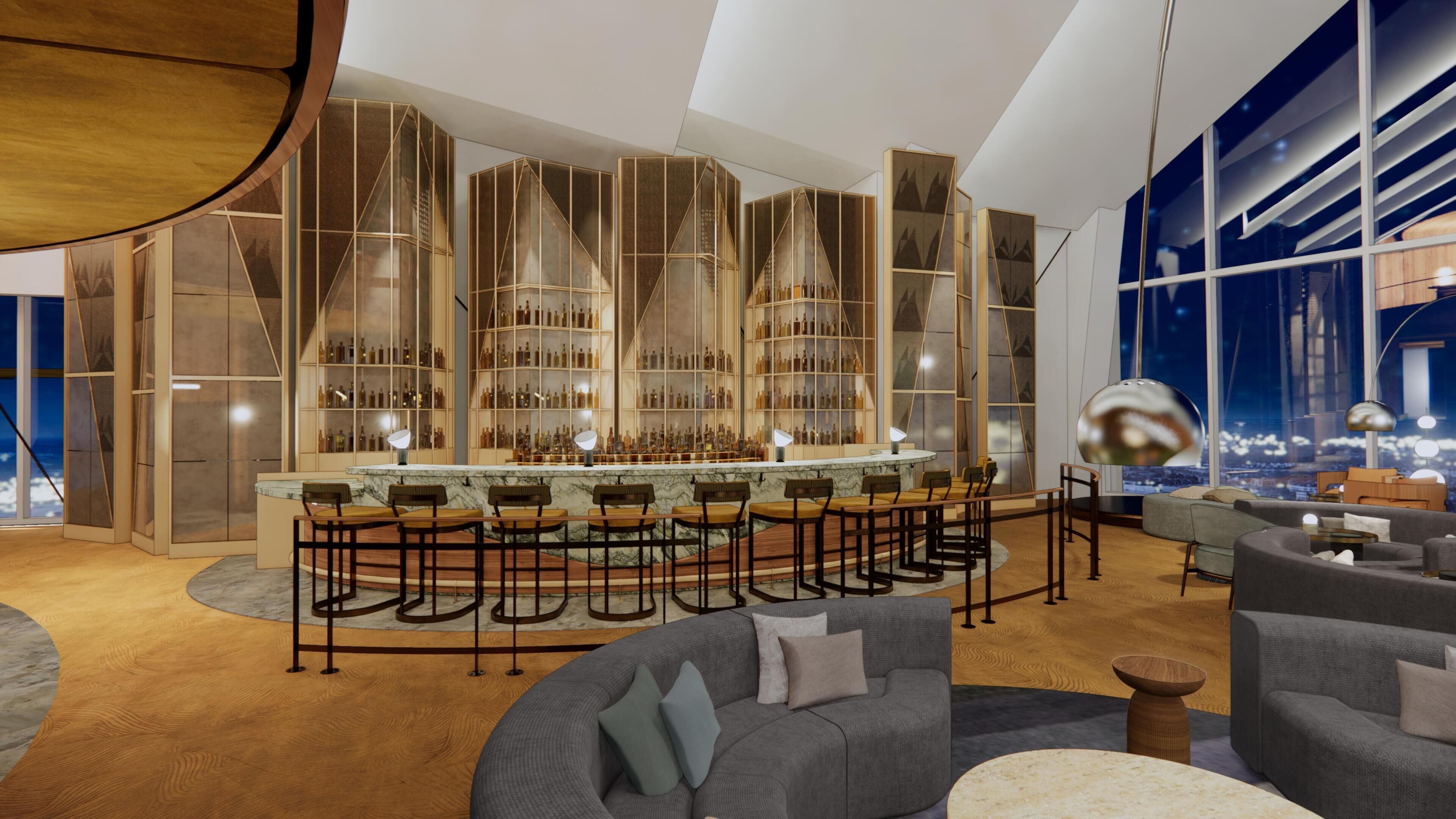 Eine moderne Bar mit einer Theke und Sitzgelegenheiten, umgeben von hohen Regalen mit Flaschen.