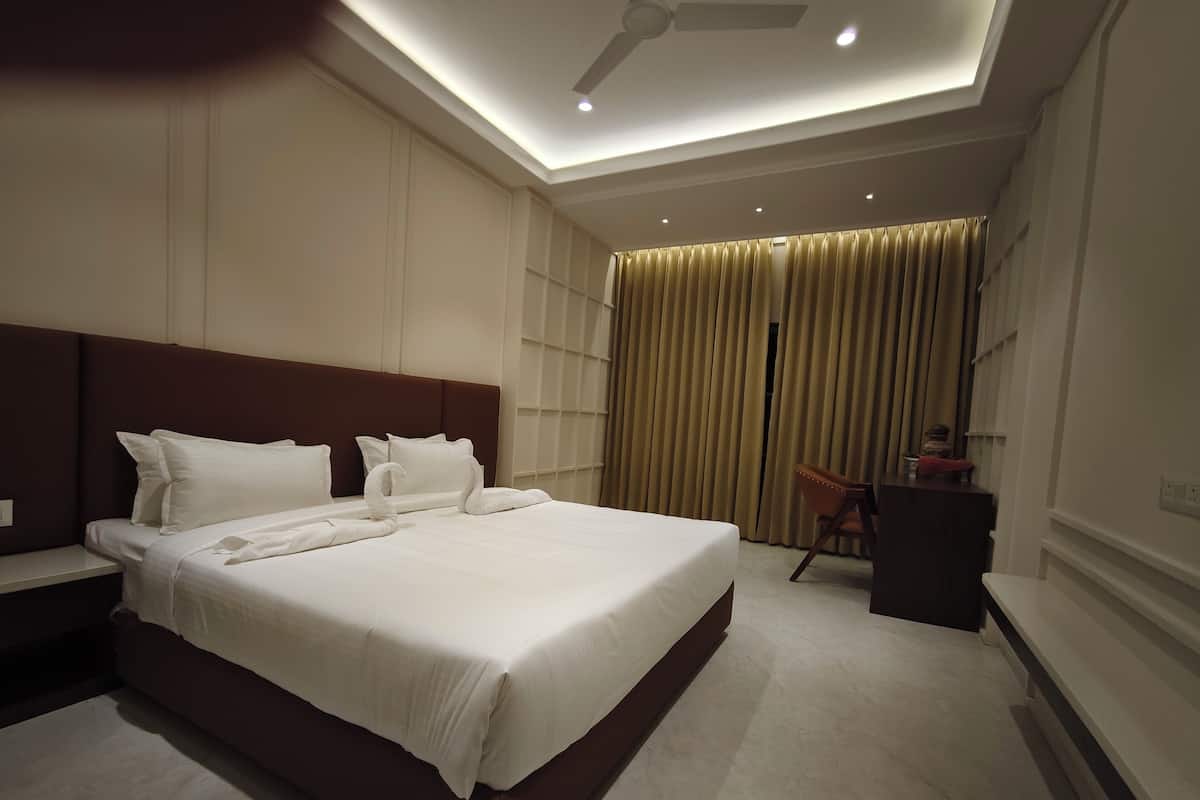 ห้องดีลักซ์ | โต๊ะทำงาน, พื้นที่ทำงานแบบใช้แล็ปท็อป, เ ตารีด/โต๊ะรีดผ้า, Wi-Fi ฟรี