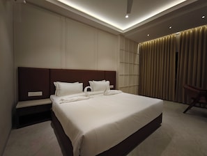 ห้องดีลักซ์ | โต๊ะทำงาน, พื้นที่ทำงา นแบบใช้แล็ปท็อป, เตารีด/โต๊ะรีดผ้า, Wi-Fi ฟรี