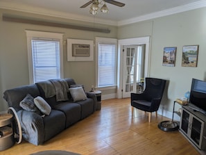 Living area - Newly renovated late 1800's space with rich wood floors and French doors (Marshall)