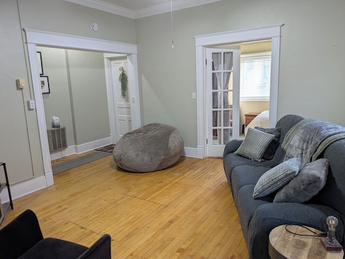 Newly renovated late 1800's space with rich wood floors and French doors