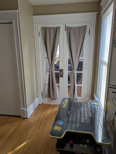 Newly renovated late 1800's space with rich wood floors and French doors