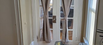 Newly renovated late 1800's space with rich wood floors and French doors