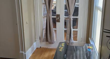 Newly renovated late 1800's space with rich wood floors and French doors