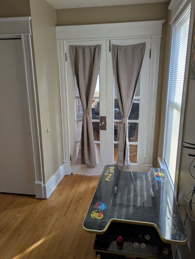 Newly renovated late 1800's space with rich wood floors and French doors