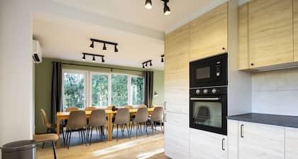 Fully renovated in 2025, "Le Havre de la Forêt" is a luxurious holiday home for 12 people offering exceptional comfort with six bedrooms, a private garden, and an outdoor Nordic bath in the heart of the Ardennes.