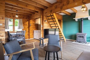 TV - This 5-person Finnish chalet features two bedrooms, an equipped kitchen, a living area with a wood stove, and a terrace with valley views. (Dochamps)