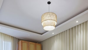 A hotel room with two beds, a large window with curtains, a wooden wardrobe, and a hanging light fixture. - VESTA  - Luxury APT - 4BR - New Cairo (II) (New Cairo City)