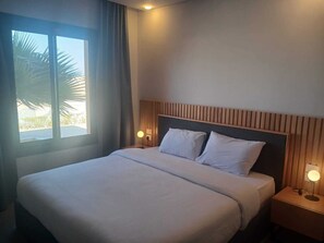1 dormitorio, tabla de planchar con plancha, wifi gratis y ropa de cama