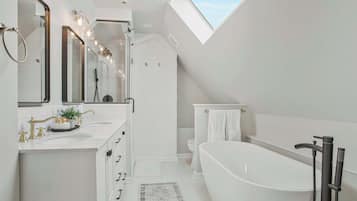 Shower, hair dryer, towels, shampoo