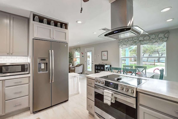 Coffee/tea maker, fridge, microwave, oven - Sandy Beach Retreat,  Escape to a coastal paradise in this charming 3-bedroom, 2-bath house in Fulton, Texas! (Fulton)