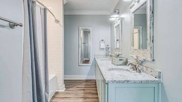 Shower, hair dryer, towels, shampoo