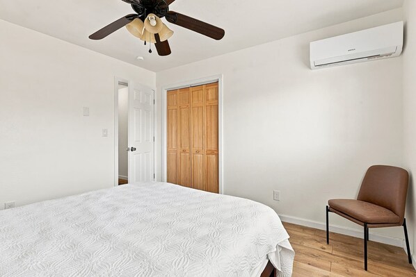 Another view of the queen bedroom and its closet.