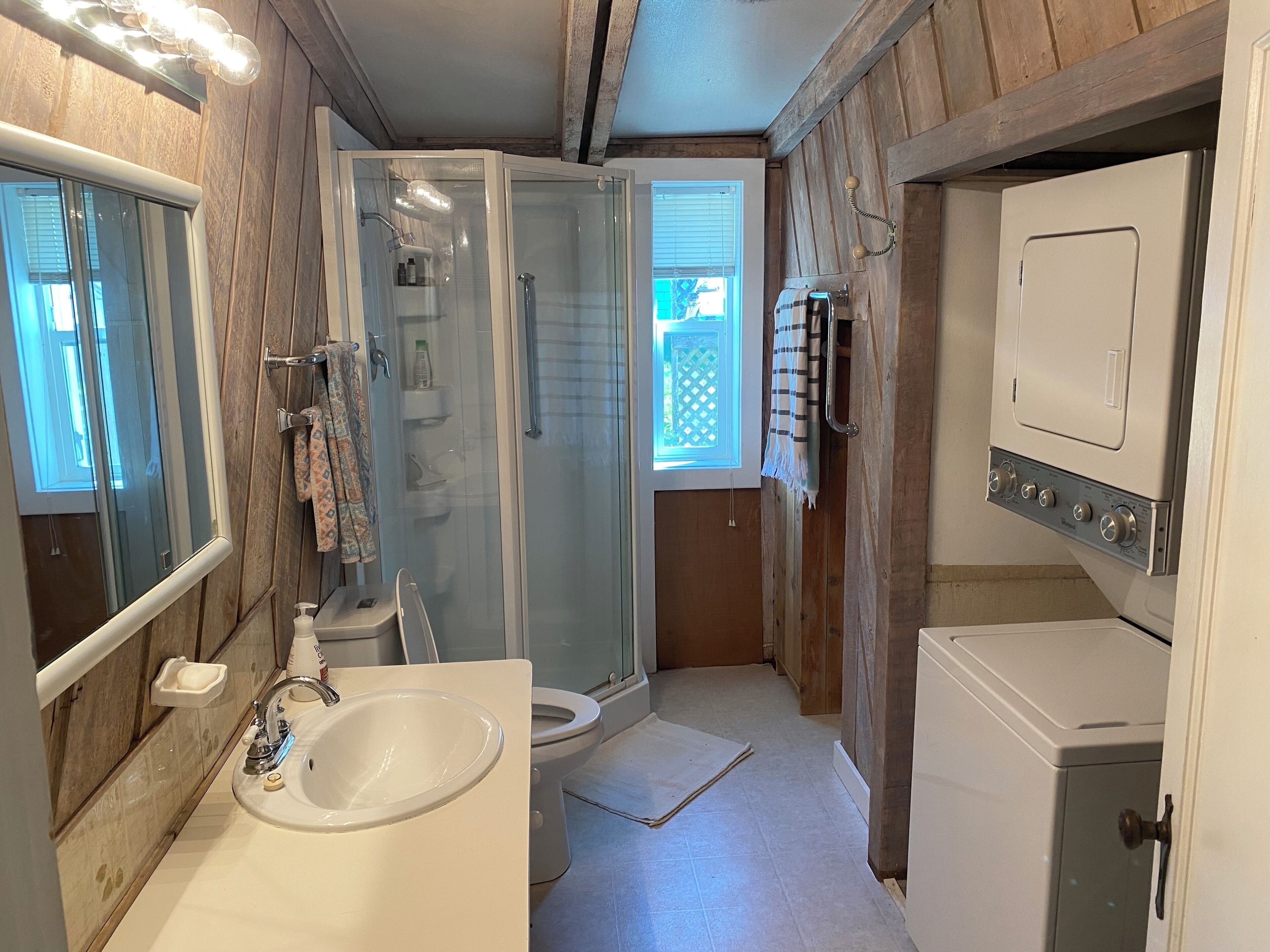 Shower, towels, soap, toilet paper
