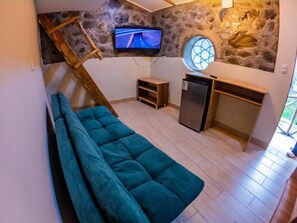 Bungalow - uteplats - utsikt mot trÀdgÄrden | Vardagsrum