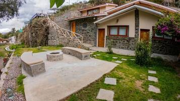 Bungalow, Patio, Garden View | Property grounds