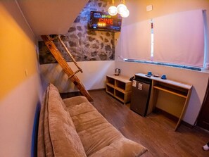 Bungalow, patio, vistas al jardín | Zona de estar