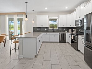 Fridge, microwave, oven, stovetop - LAKEVIEW Themed Home w/ Pool & Theater Near Disney (3033) (Kissimmee)