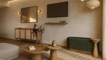 Quarto luxo, vista para o jardim | Área de estar