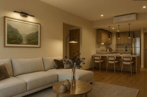 Camera Deluxe, vista giardino | Area soggiorno