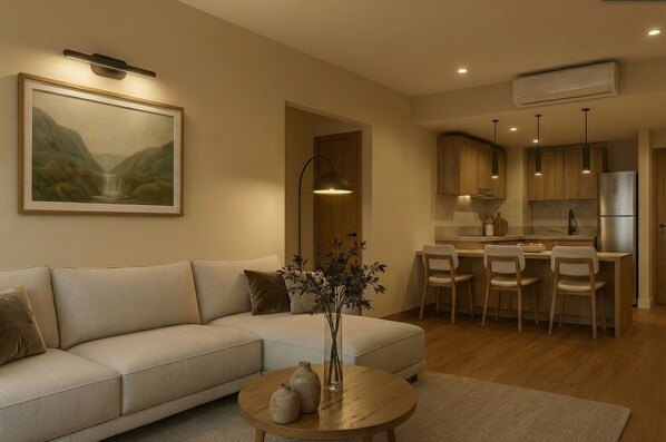 Deluxe Room, Garden View | Living area