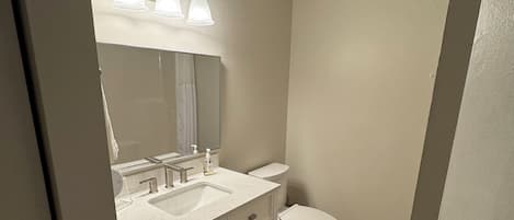 Hair dryer, towels, soap, toilet paper