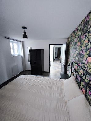 2 bedrooms, soundproofing, iron/ironing board, travel crib