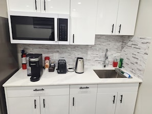 Fridge, microwave, coffee/tea maker, electric kettle