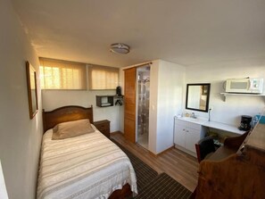 Habitación individual básica, balcón, vista al jardín