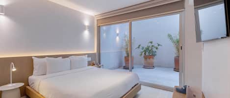 Luxury Studio, Patio | In-room safe, laptop workspace, iron/ironing board, free WiFi