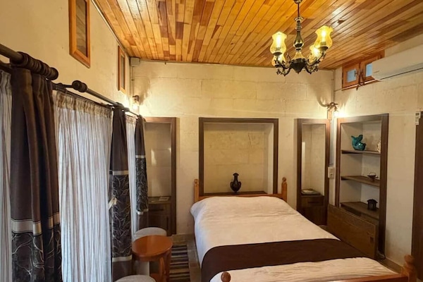 Premium bedding, free minibar items, in-room safe