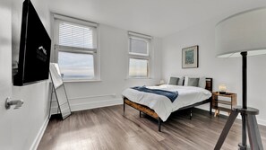 2 habitaciones, tabla de planchar con plancha, wifi y ropa de cama