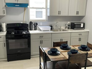 Fridge, microwave, oven, stovetop - Cozy Getaway located in Newark, New Jersey (Newark)