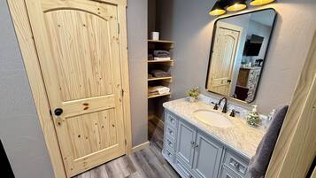 Shower, towels, soap, toilet paper