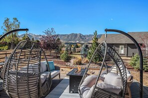 Terrace/patio - 5 Bedroom house with amenities galore! Oversized hot tub, outdoor fire pit, smoker and propane grill, sauna, play set, espresso machine, air hockey table, indoor fireplace in both living rooms, and legacy bar. (Colorado Springs)