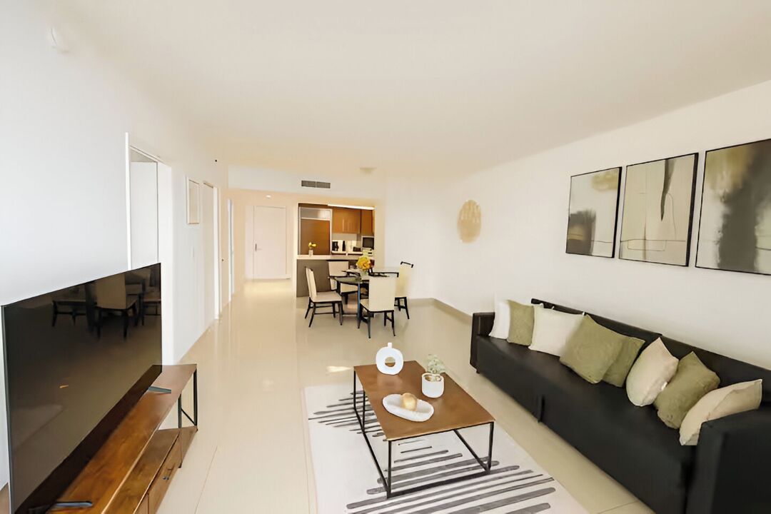 Comfort-Suite, Balkon, Meerblick | Wohnbereich