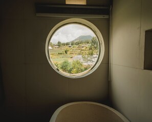 Deluxe Room | Bathroom | Hair dryer, towels, soap, shampoo - Garden Hill Kintamani Natural Hot Spring (Kintamani)