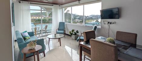 Deluxe Apartment, Balcony, Mountain View | Living area