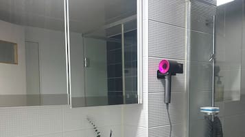 Hair dryer, towels, soap, toilet paper
